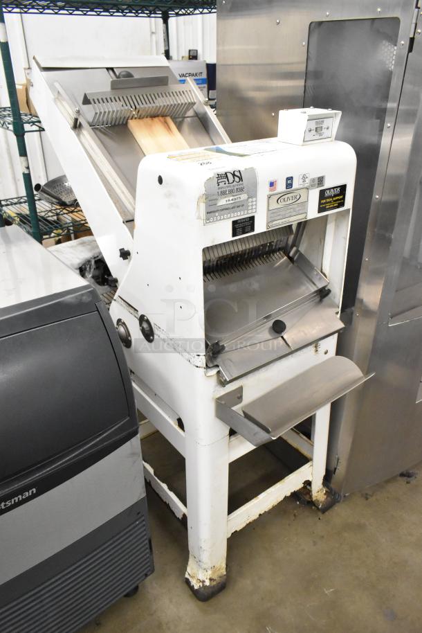 Oliver 797-32NC metal commercial bread loaf slicer on casters, 115V, 1 phase, lightly used with visible wear and labels.