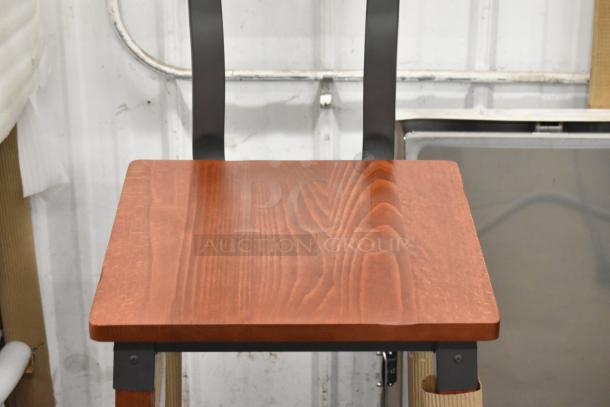 9 brand new Lancaster Table & Seating industrial backless bar stools, rustic mahogany finish, scratch and dent condition.
