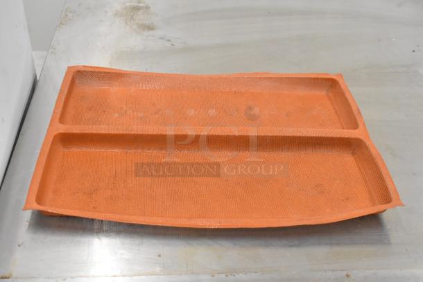 20 orange Silform 2-loaf baking pan liners, used. Features durable silicone mesh for even baking and easy release.
