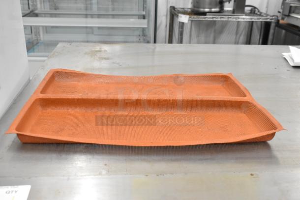 Orange Silform 2 loaf baking pan liner, made of durable silicone, slightly used, ideal for commercial baking.