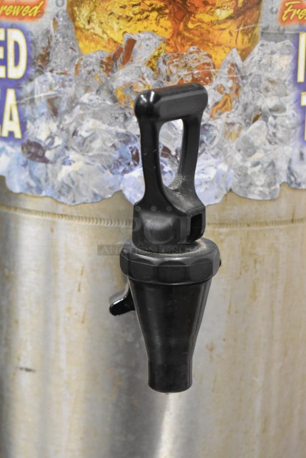 Bunn TDO stainless steel beverage dispenser with black spigot, iced tea graphic. Good condition.