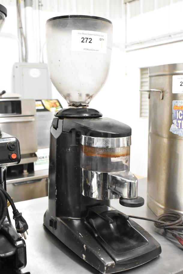 Metal commercial countertop espresso bean grinder, 115 volts, 1 phase. Black and silver, visible wear. Auction label reads "272".
