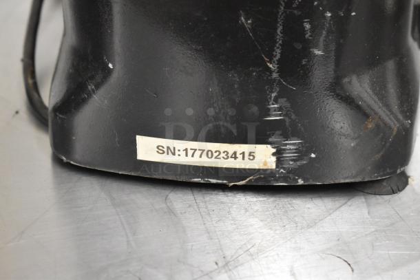 Metal commercial countertop espresso bean grinder, 115 volts, 1 phase. Serial number label: SN:177023415.