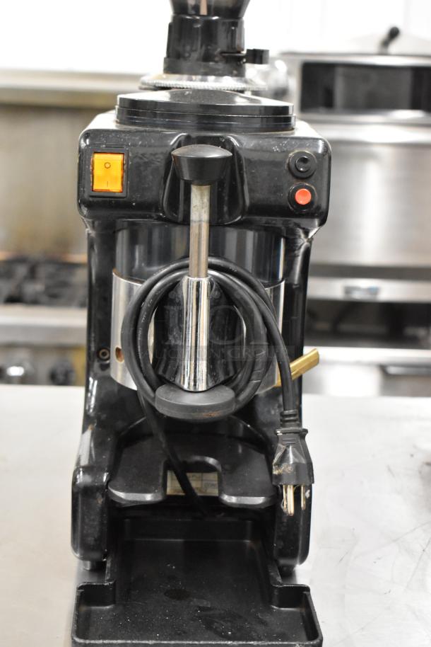 Bregani metal commercial countertop espresso bean grinder, 115 volts, 1 phase, in good condition with visible power switch and cord.
