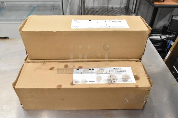 Cardboard boxes of new items including 3M SW-SR-60 cartridge, Chief FCK016 Fusion connector kit, and 3M HF8-S water filter.