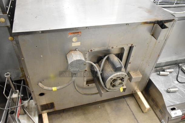 Vulcan stainless steel commercial convection oven, full size, thermostatic controls, metal racks, view-through doors, used condition.