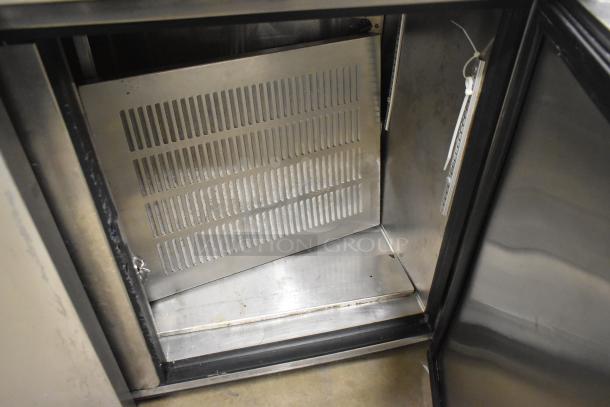 True TUC-48F-LP Stainless Steel 2 Door Undercounter Freezer interior. Commercial grade, 115 Volts, 1 Phase.