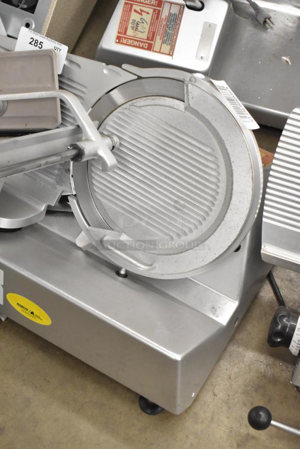 Bizerba SE 12 US metal countertop meat slicer, 120V, 1 phase, visible safety label, commercial-grade condition.
