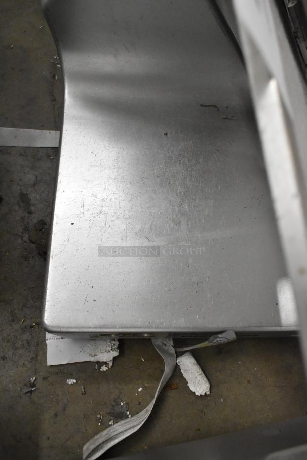 Bizerba SE 12 US metal commercial countertop meat slicer. Shows surface wear; 120 volts, 1 phase.