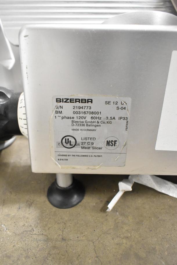 Bizerba SE 12 US metal commercial countertop meat slicer, 120V, 1 phase, NSF and UL listed, used condition, visible labels.