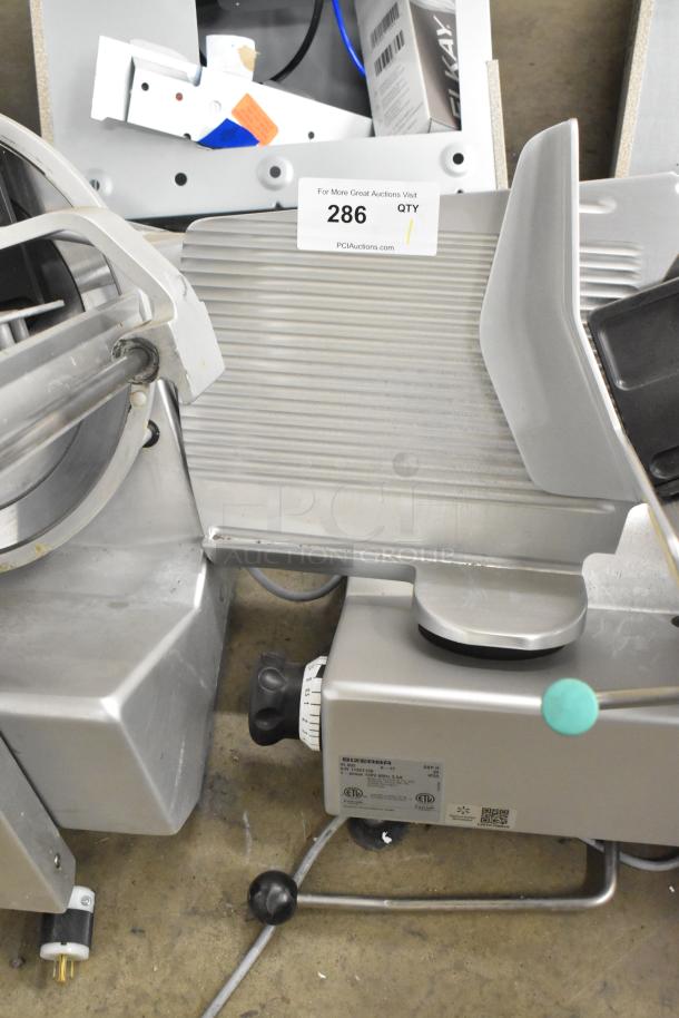 2017 Bizerba GSP H metal commercial meat slicer, 120V, 1 phase, countertop model, silver, in good condition with control dials.