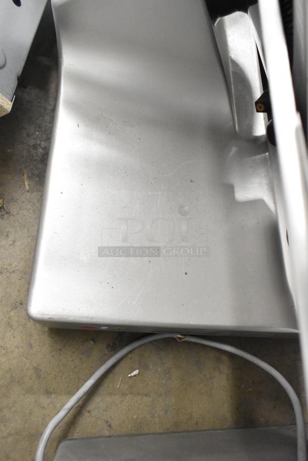 2017 Bizerba GSP H metal countertop meat slicer, 120V, 1 phase. Shows surface wear, used condition, cord visible.