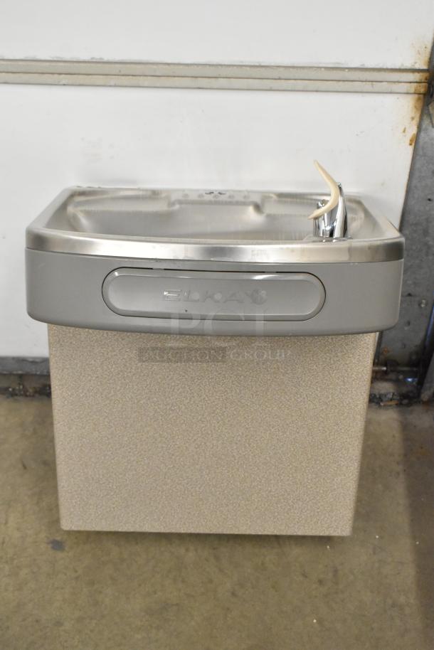 Brand new Elkay EZSTLDWS_1G stainless steel wall mount water fountain, 115 volts, 1 phase, visible scratch and dent.