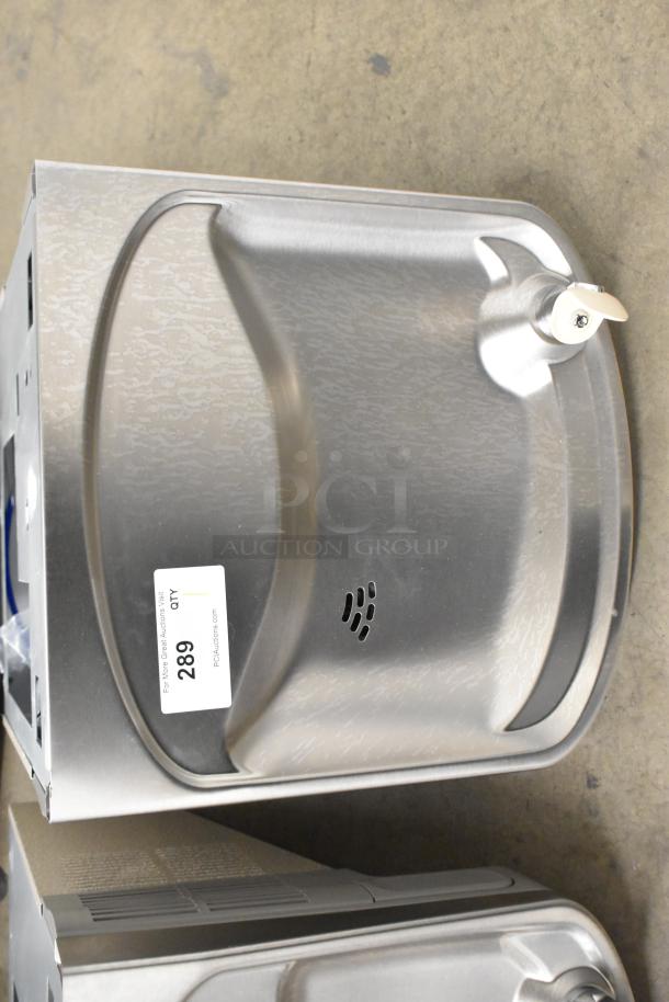 BRAND NEW Elkay EZSTLDWS_1G stainless steel wall mount water fountain, 115V, 1 phase. Minor scratches and dents visible.