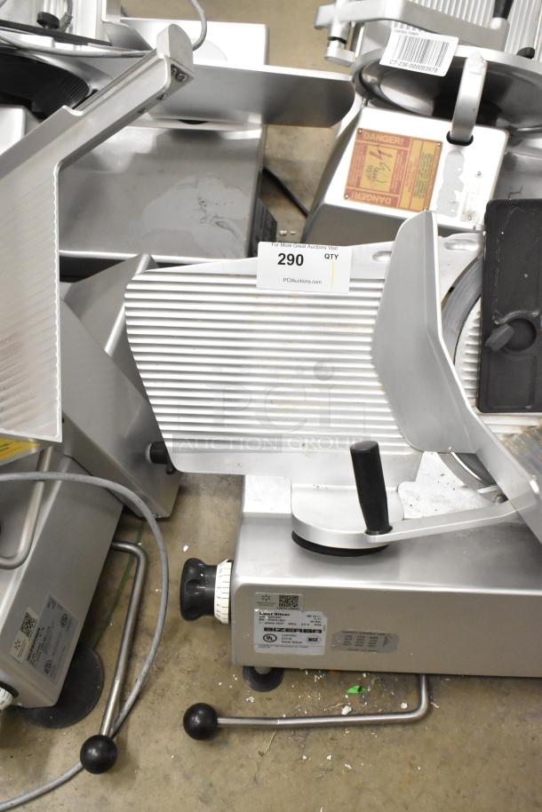 Bizerba SE 12 US metal commercial meat slicer, 120 volts, 1 phase; includes visible control dials and safety warnings.