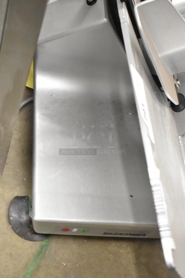 2016 Bizerba GSP H metal commercial meat slicer, 120V, 1 phase, in used condition. Bizerba logo on base.