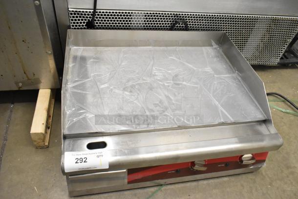 Brand new Avantco 177EG24N 24" stainless steel electric countertop griddle, 208/240 volts, 1 phase, with minor scratches.