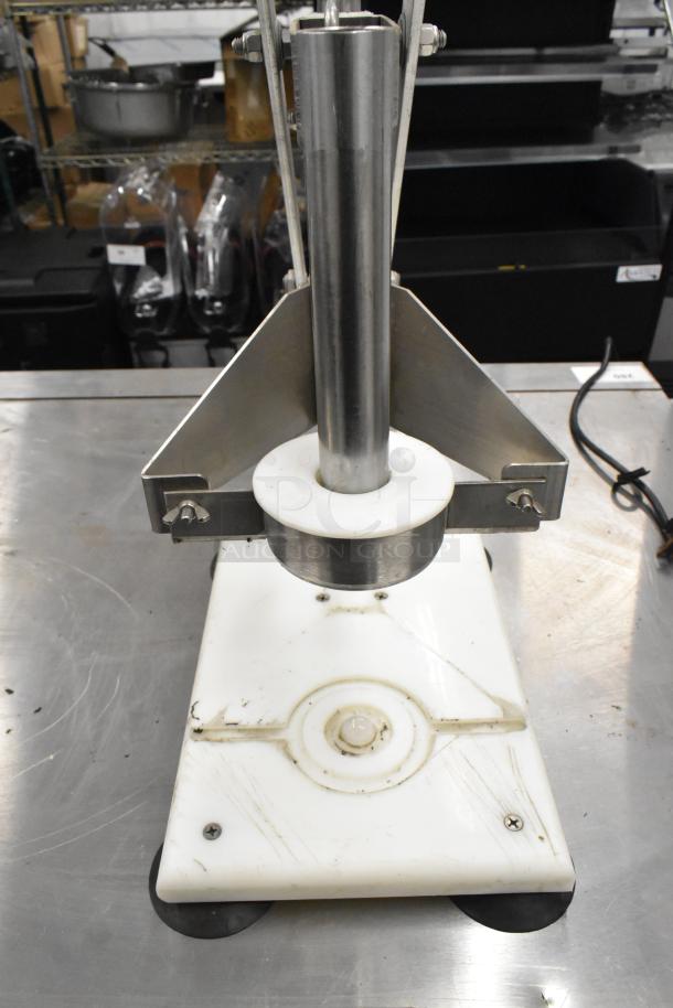 E-Z Cut II Metal Countertop Pineapple Corer, stainless steel, used condition, sturdy base, commercial kitchen tool.