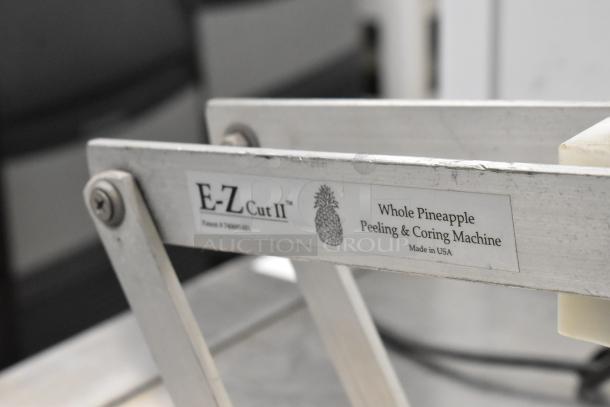 E-Z Cut II Metal Countertop Pineapple Corer; whole pineapple peeling and coring machine; patent and Made in USA label.