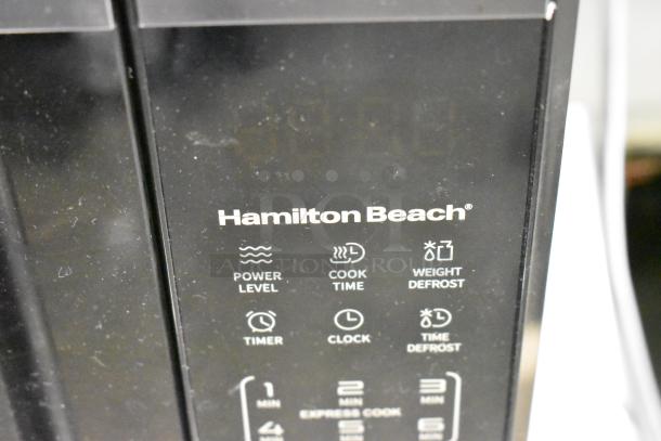 2024 Hamilton Beach countertop microwave, model HB8436193153-03. Features power level, cook time, defrost options.