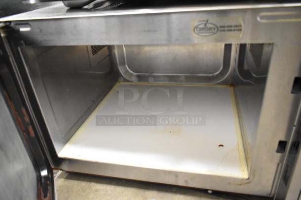 2017 Amana RCS10TS stainless steel commercial microwave, interior view, showing used condition and signs of wear.