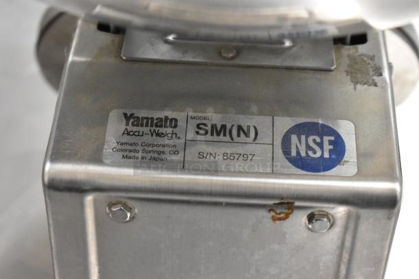 Two metal countertop scales, including Yamato SM(N) with NSF certification, and Marco SW10211. Used condition.
