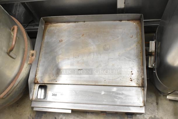 Cecilware EL-1624 stainless steel countertop electric griddle, 240 volts, used condition with visible wear. Auction tag marked "300 QTY."