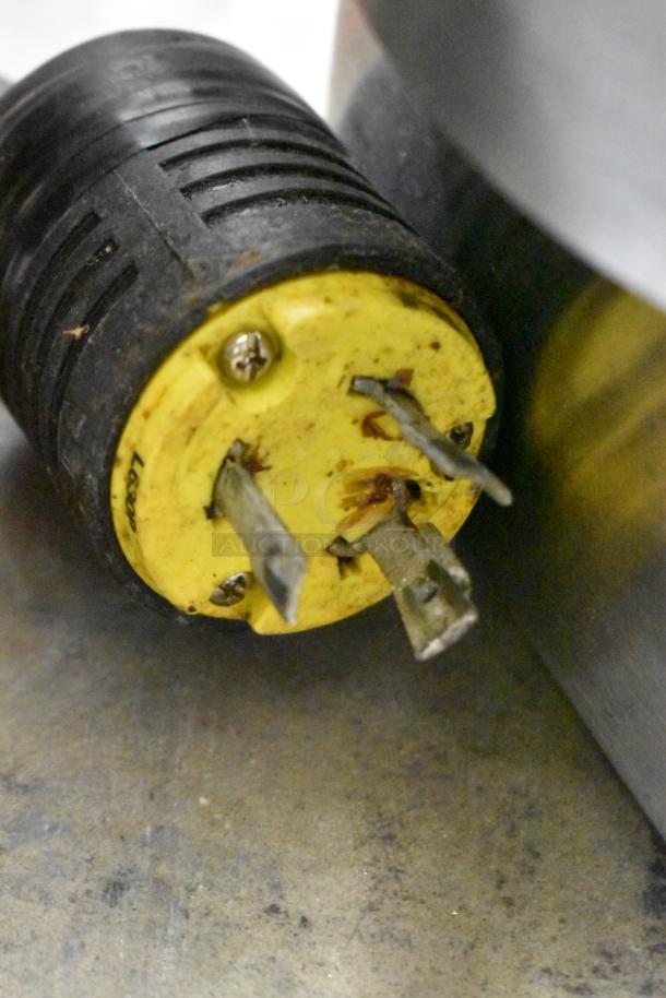 Close-up of the plug for a Cecilware EL-1624 countertop electric griddle, 240 volts, showcasing the plug's condition.