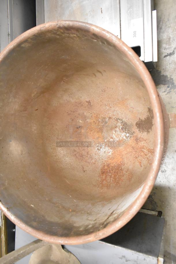 Hobart mixer metal bowl, 24x24x26 inches, some rust. Includes dough hook attachment. Auction: 2 times your bid.
