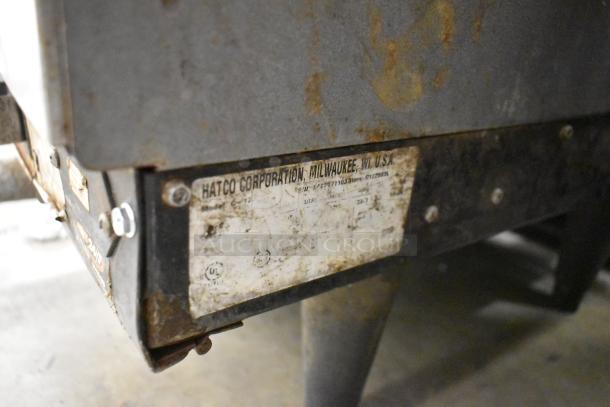 Hatco C-12 Metal Commercial Hot Water Booster Heater, showing wear, with manufacturer's label, Milwaukee, USA.