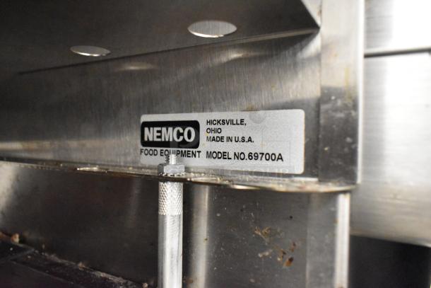 Nemco 69700A Metal Countertop Dry Cookie Merchandiser Case with manufacturer label. Made in the USA, food equipment.