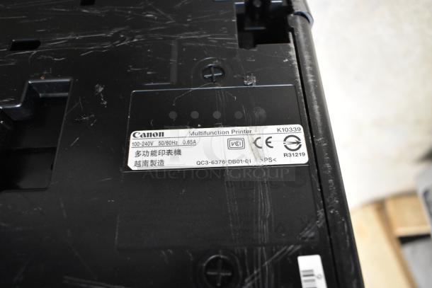 Canon K10339 printer showing usage wear with visible label indicating model and specifications.