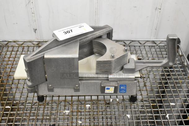 Nemco Metal Countertop Tomato Slicer, excellent condition, features a stainless steel blade assembly, non-slip feet, NSF certified.