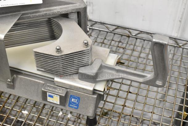 Nemco metal countertop tomato slicer with sharp blades, NSF certified, made in USA, excellent condition, sturdy handle.