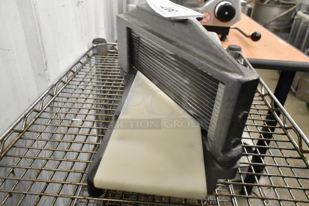 Nemco Metal Countertop Tomato Slicer, durable metal frame, sharp slicing blades, used condition, suitable for commercial kitchens.
