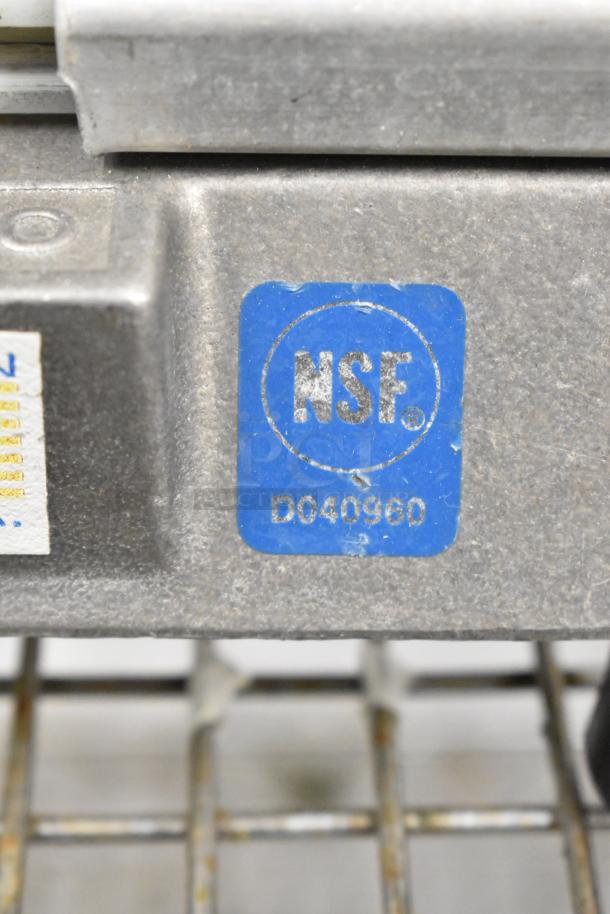 Nemco Metal Countertop Tomato Slicer with NSF certification label, item number D040960, showing durable metal construction.