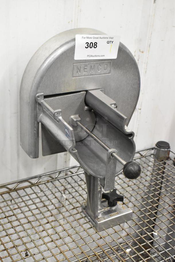 Nemco Metal Countertop Vegetable Slicer, sturdy design, stainless steel, manual operation, model number unclear, auction label attached.