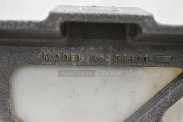 Nemco 56600 Metal Countertop Tomato Slicer, model number visible, durable metal frame, well-maintained condition.
