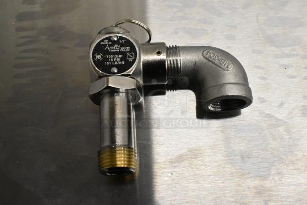 Apollo relief valve, 1/2-inch, 15 PSI, new condition. Markings: "Apollo Valves, Industrial," "1051HP." Stainless steel.