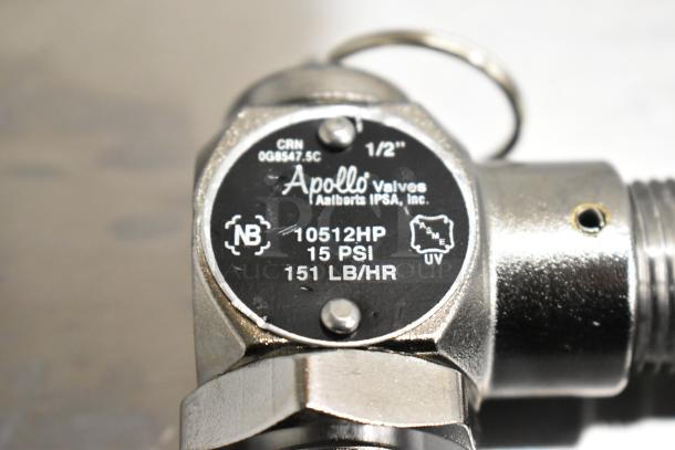 Apollo valve, stainless steel, with markings: "10512HP, 15 PSI, 151 LB/HR." Features 1/2" fitting and CRN 0G8547.5C.