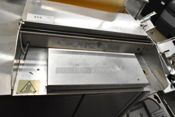 2016 Metal Countertop Wrapping Station, Model 5000156, 115 Volts, 1 Phase, used condition, metal construction, UL listed.