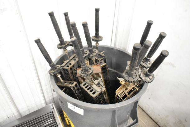 12 metal skewers with gears in a gray trash can, for rotisserie oven, multiple times your bid value.