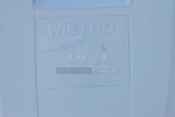 BRAND NEW Scratch and Dent Metro PCD9 Blue Poly Dish Cart with embossed logo, commercial casters, slight imperfections.