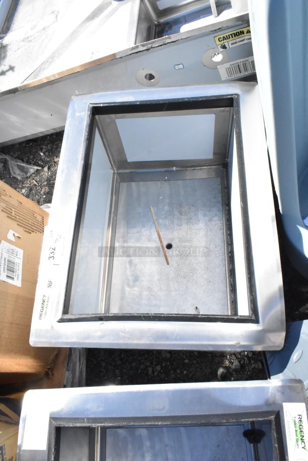 BRAND NEW SCRATCH AND DENT Regency 600IB2418CP 18"x24" stainless ice bin with 7 circuit cold plate, visible caution label.