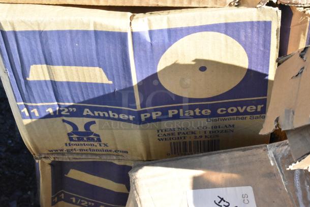 Box of GET CO-101-AM Amber Polypropylene Plate Covers, 11 1/2", 1 dozen, slightly dented packaging, dishwasher safe.
