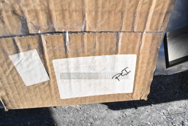 Cardboard box labeled with "HIGH GRADE LOOP," indicating Carlisle 369440B14 blue mop head inside. Box condition appears used.