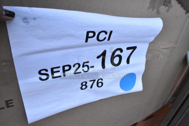 Auction lot label showing "PCI SEP25-167 876" on a cardboard background.
