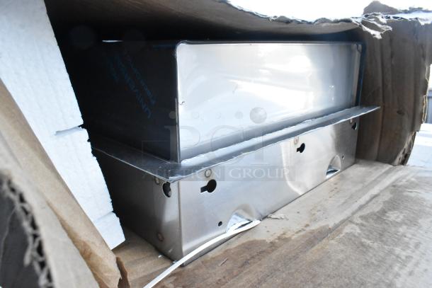 3 brand new scratch and dent items including Regency 5' soiled dish table and Avantco 60" gas griddle in packaged condition.