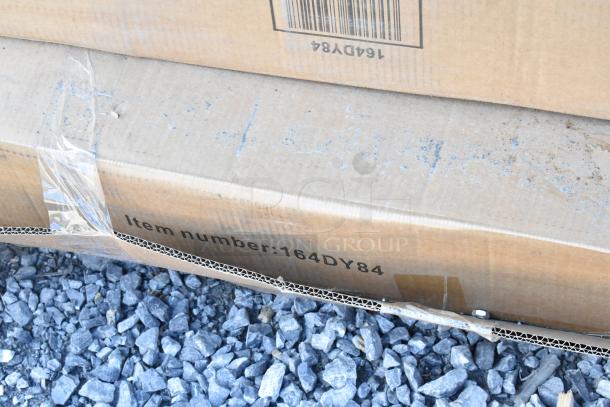 Box labeled "Item number: 164DY84", part of 12 new scratch and dent auction items including furniture and storage solutions.
