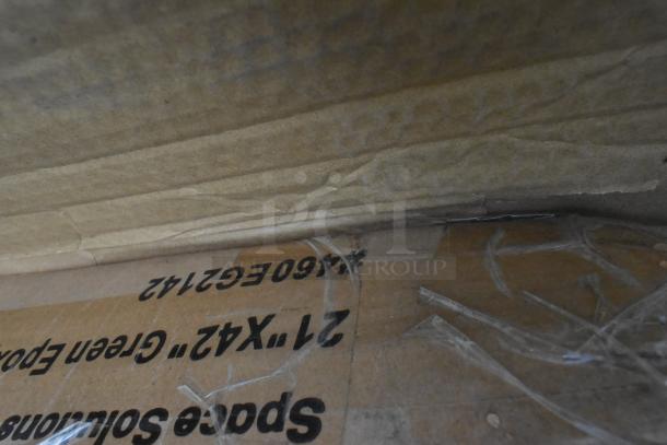 Box labeled "24x42 Green Epoxy" containing 12 brand new scratch and dent items, including an ice bagger, ticket holder, sink, and table.
